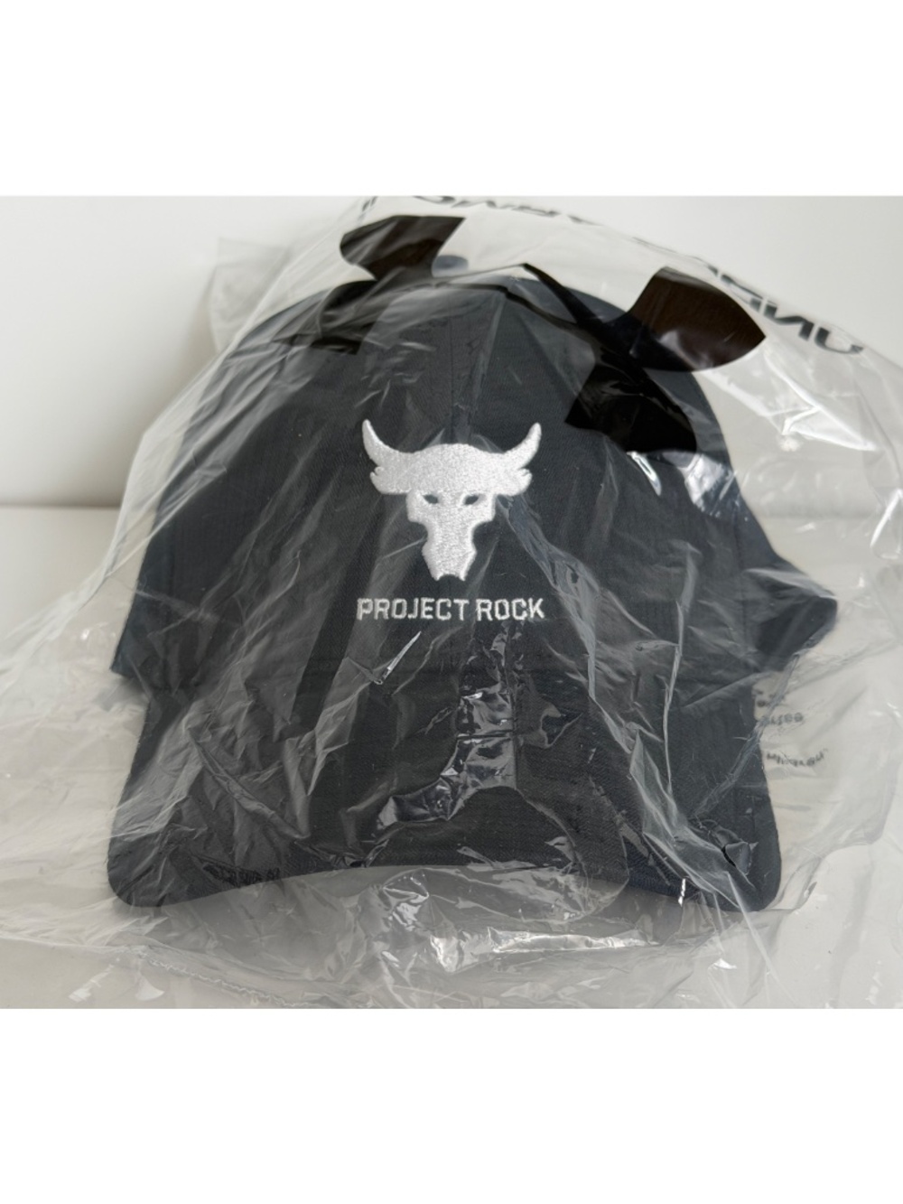 Under Armour Project Rock Trucker Cap Black White Logo 1369815 003 OSFM